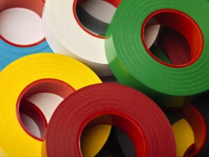 Multi-colored rolls of adhesive tape