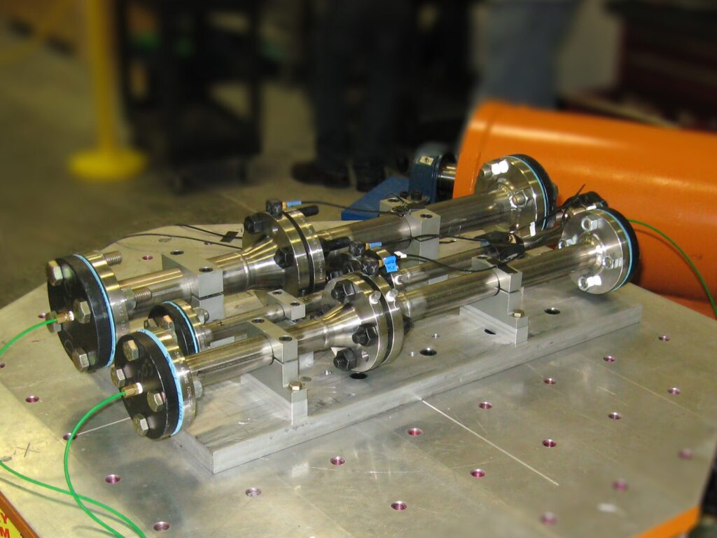 A portion of a pipeline on a seismic table for vibration testing