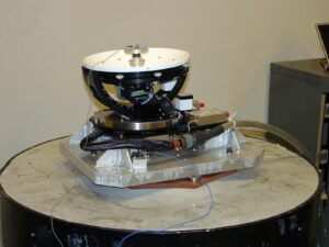 A satellite strapped to a shaker table for vibration table