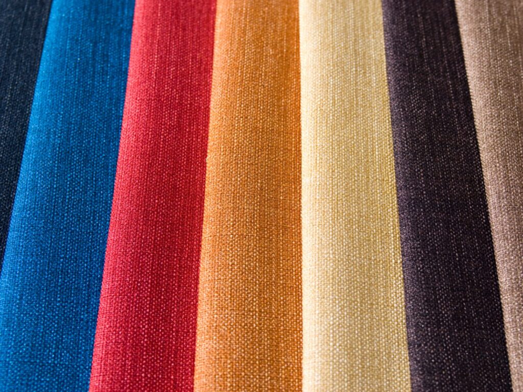 Overlapping colorful fabric swatches