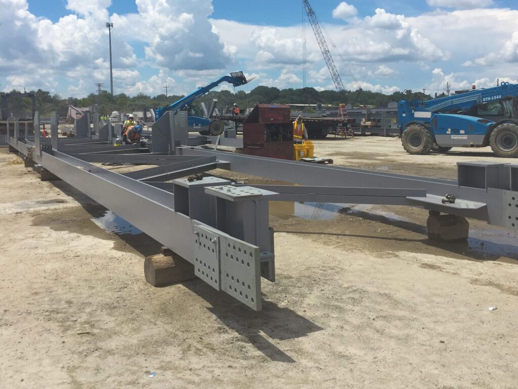 Mechanical testing experts inspect a downed truss system
