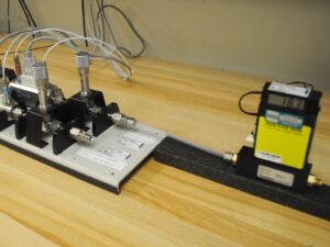 Electric calibration of a gas flow meter