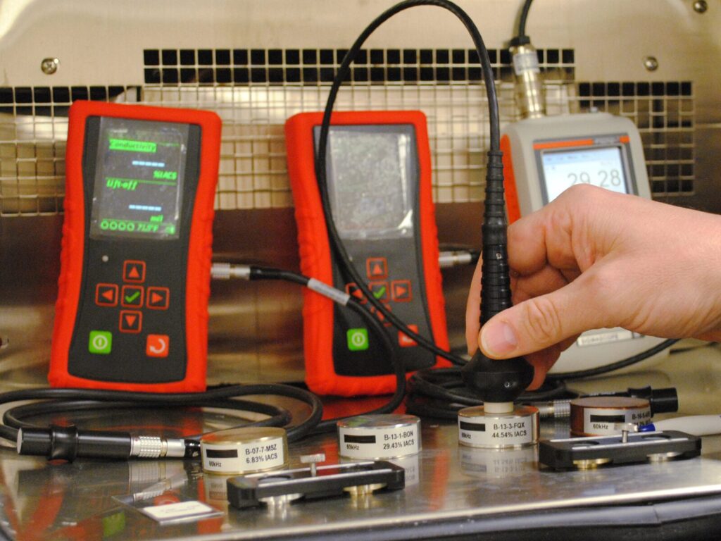 Three handheld conductivity meters