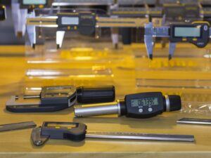 Tabletop with a collection of bore gauges and Vernier length gauges