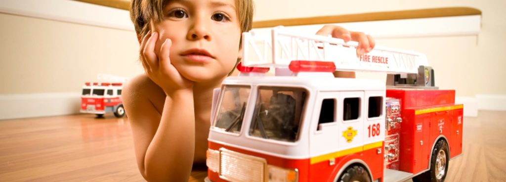 Little boy and his fire truck - consumer testing laboratories