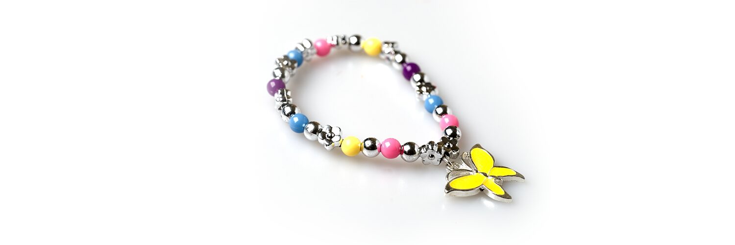 Child's beaded bracelet with a butterfly charm