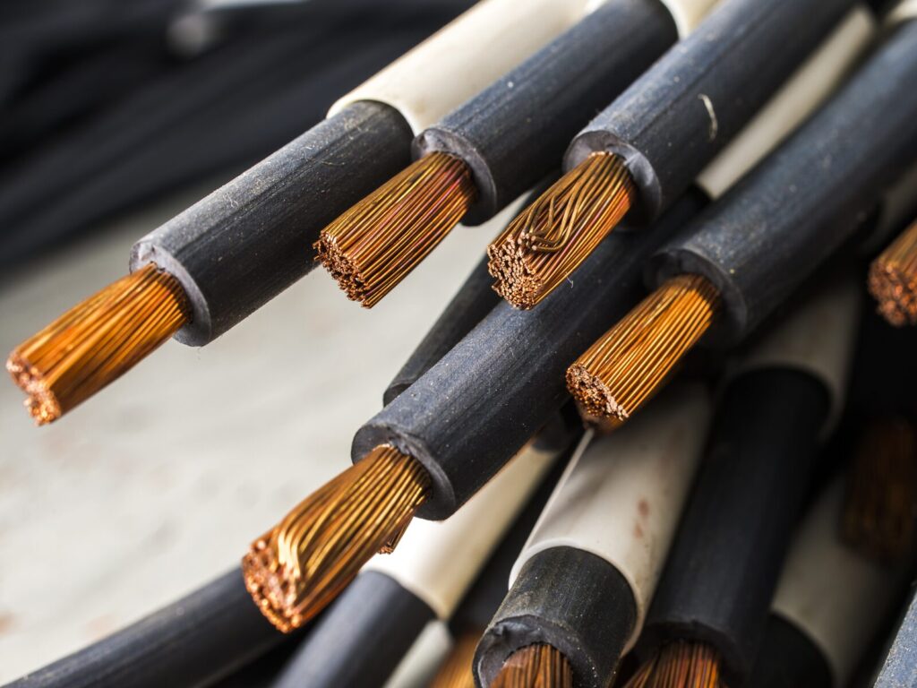 Several electrical wires with exposed copper insulation