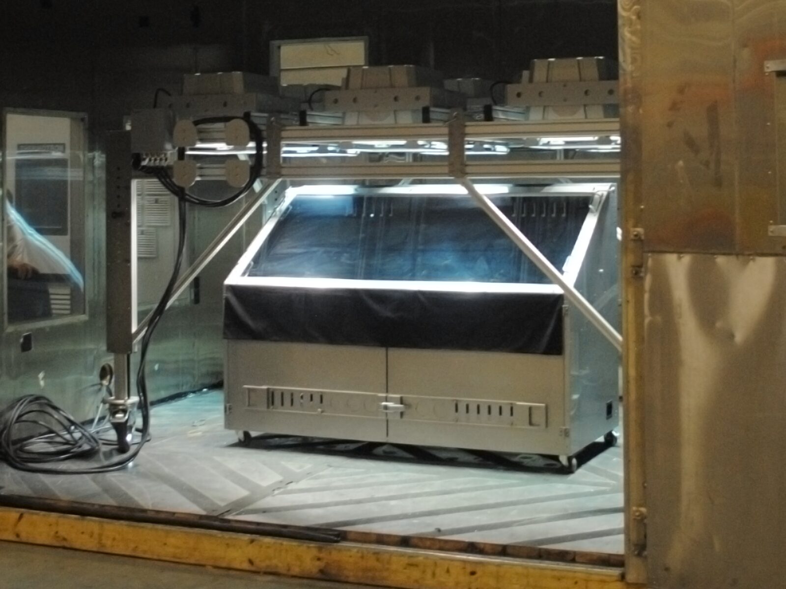 A large environmental chamber for solar simulation of military-grade products.