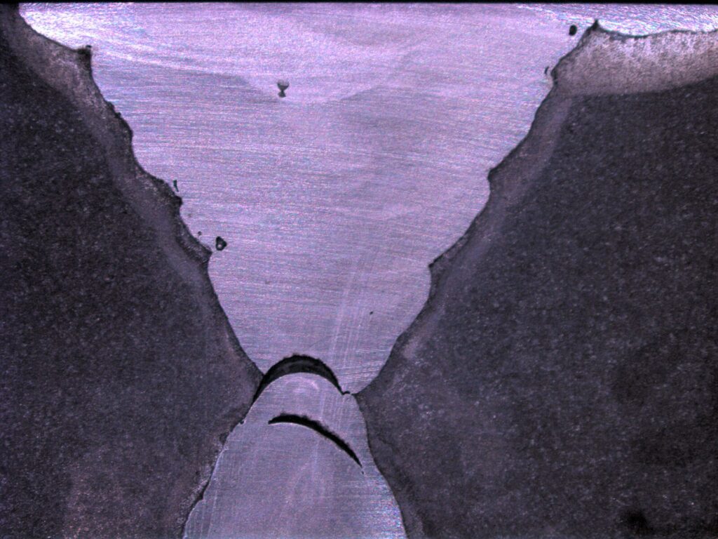 Magnified weld face of a groove weld.