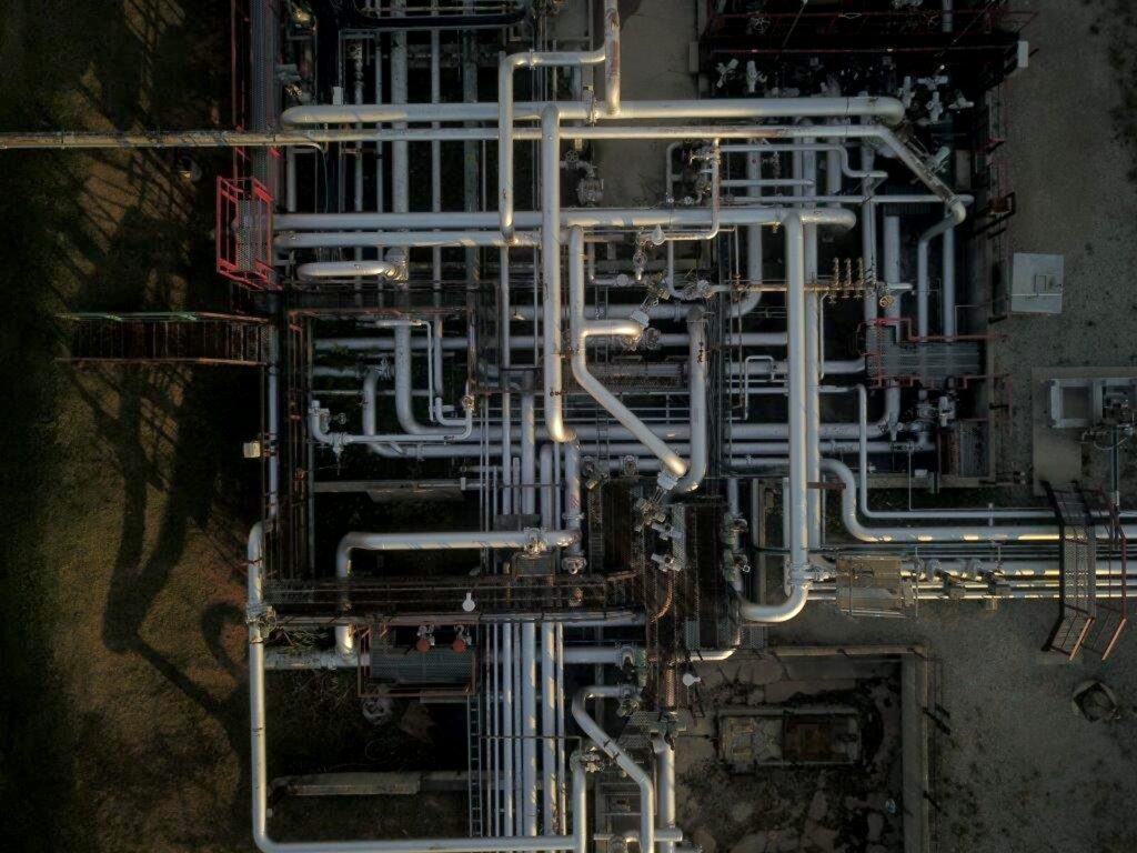 Aerial view of an above-ground pipeline at dawn. Photo taken with a drone.