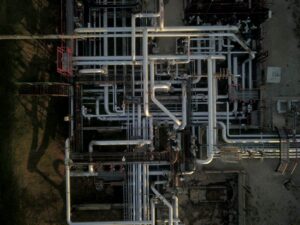 Aerial view of an above-ground pipeline at dawn. Photo taken with a drone.