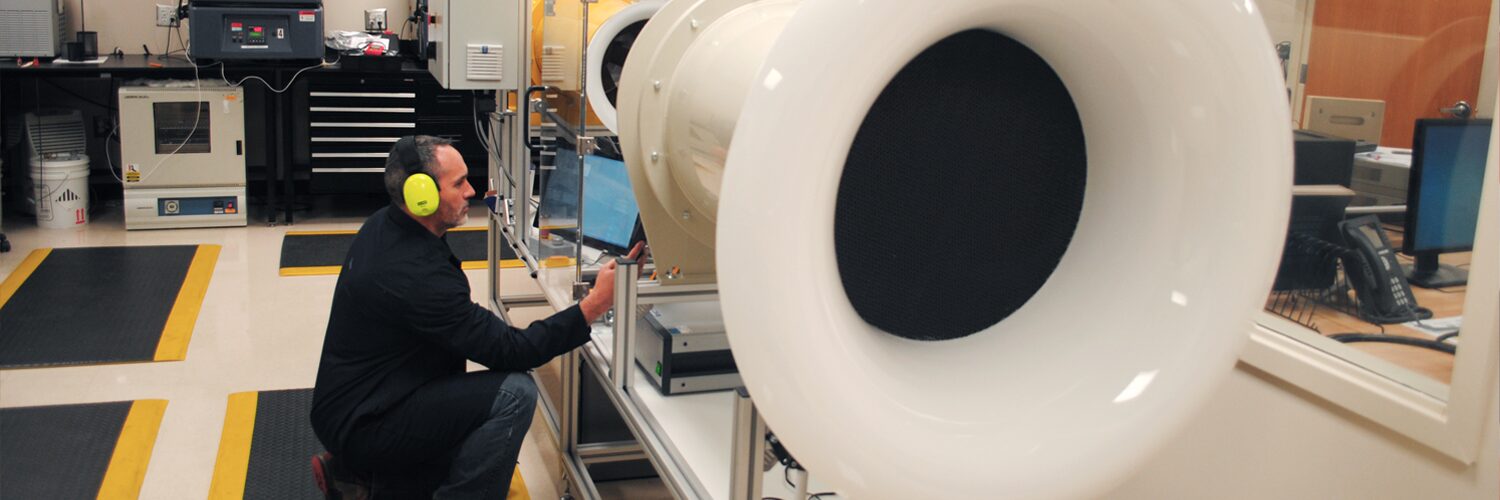 Lab technician calibrates a wind tunnel