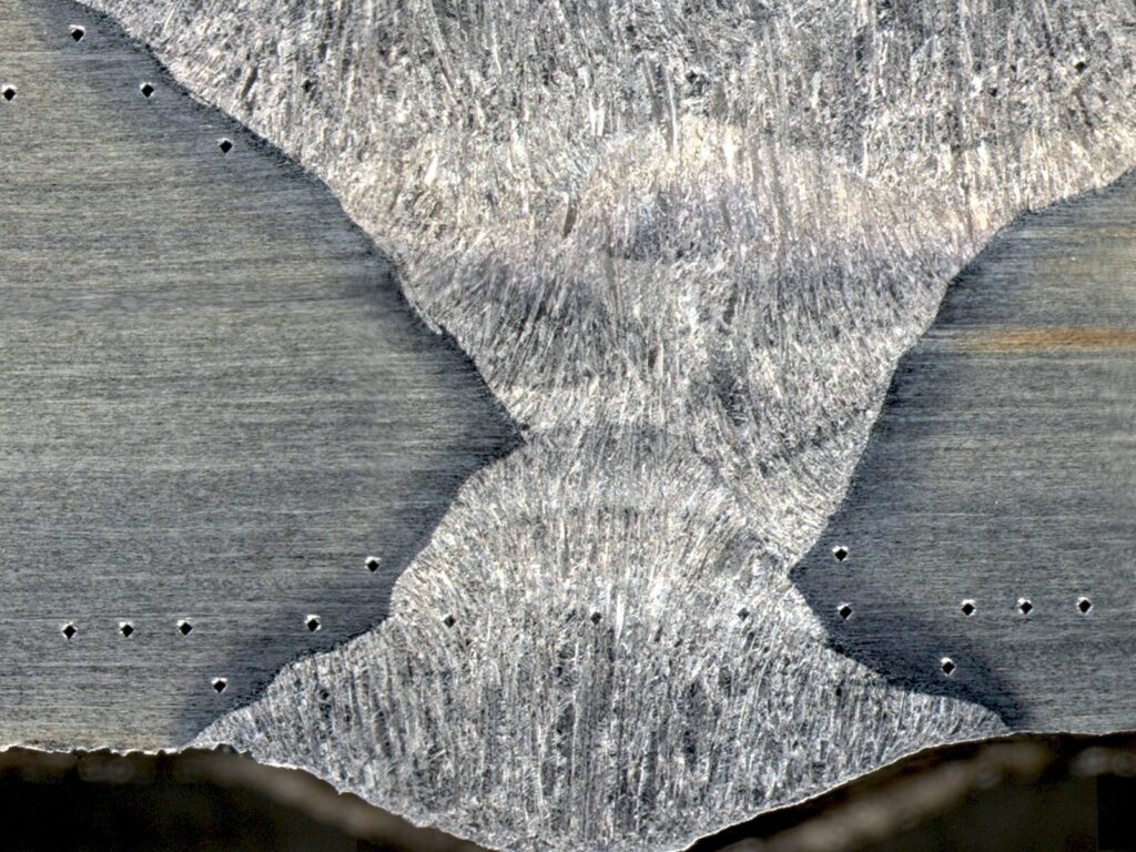 Microscopic view of a weld during microhardness testing