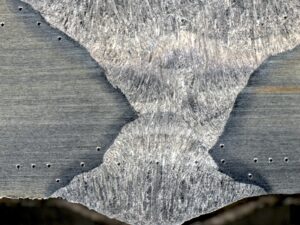 Microscopic view of a weld during microhardness testing