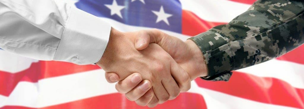 Returning Serviceman Shaking Hands with Future Employer