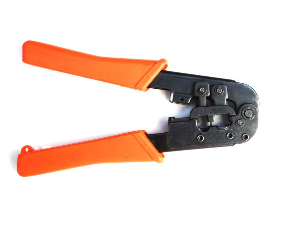 Crimp tool against a white background