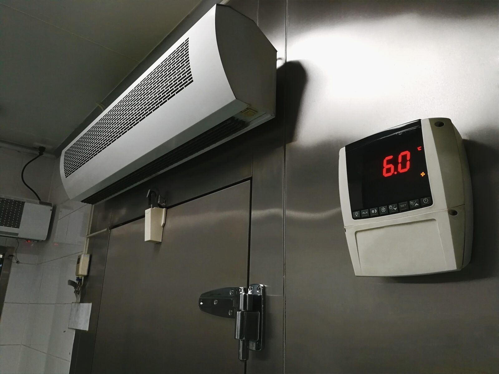 Digital temperature display outside a walk-in refrigerator