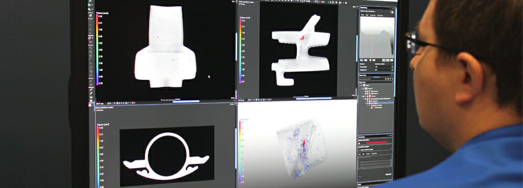 Technician Viewing CT Models of Sample Component