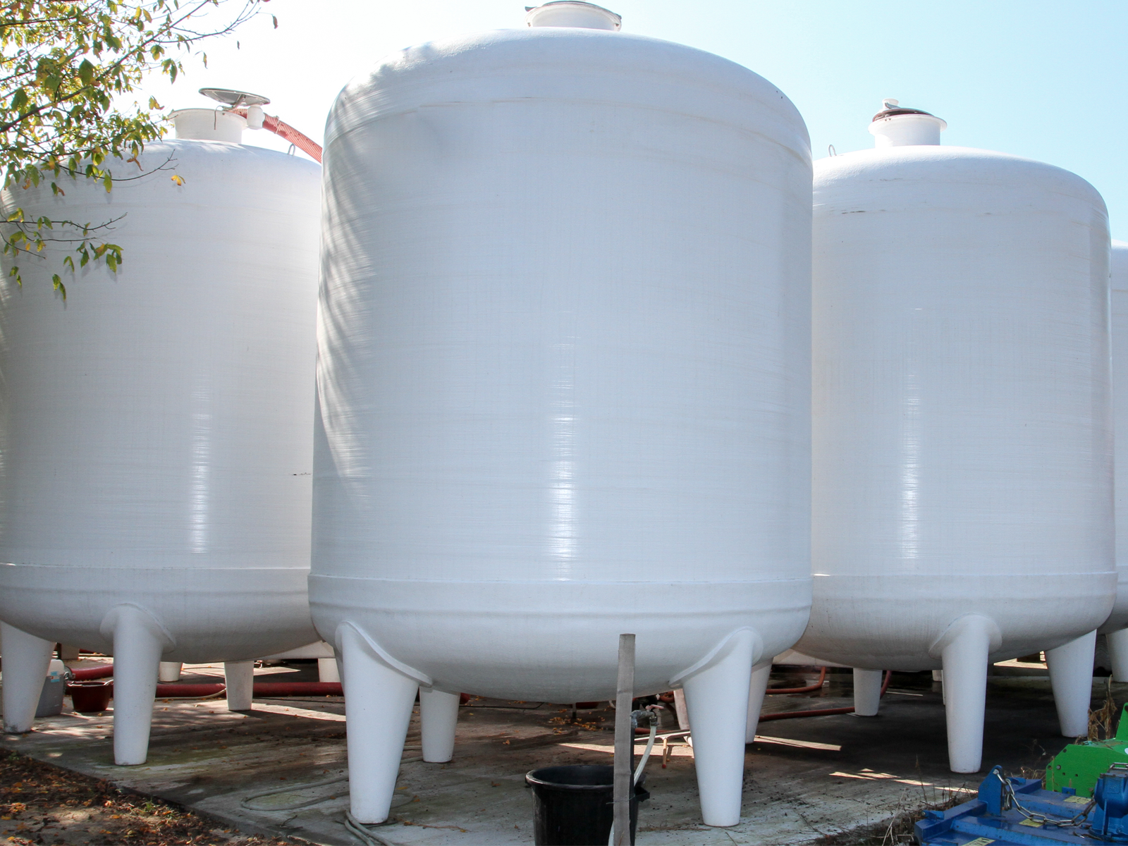 Three aboveground storage tanks made of fiberglass