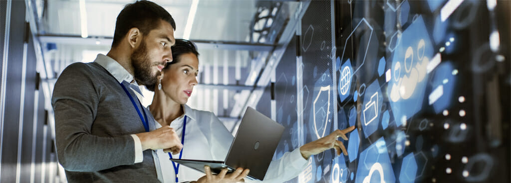 Stock Photo of IT Professionals Managing a Server Room