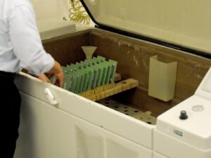 Salt fog chamber loaded with samples