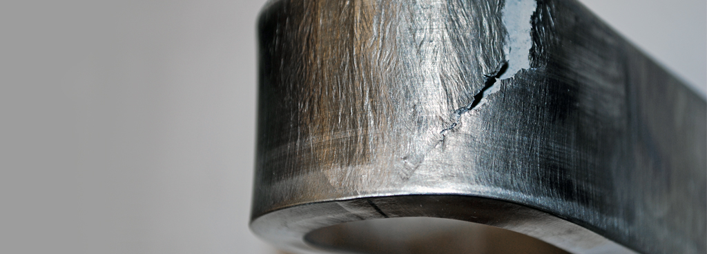 Failed bend testing weld sample