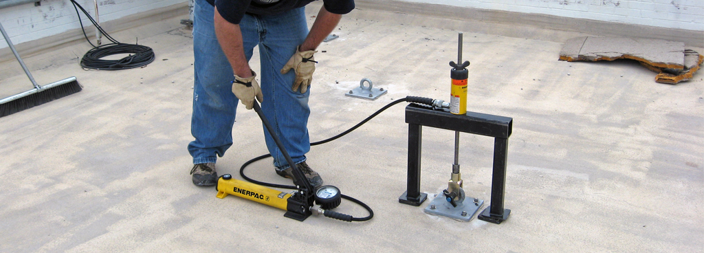 Load testing a roof anchor