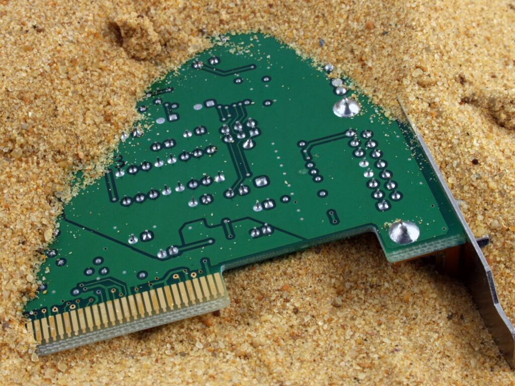Circuit board embedded in sand