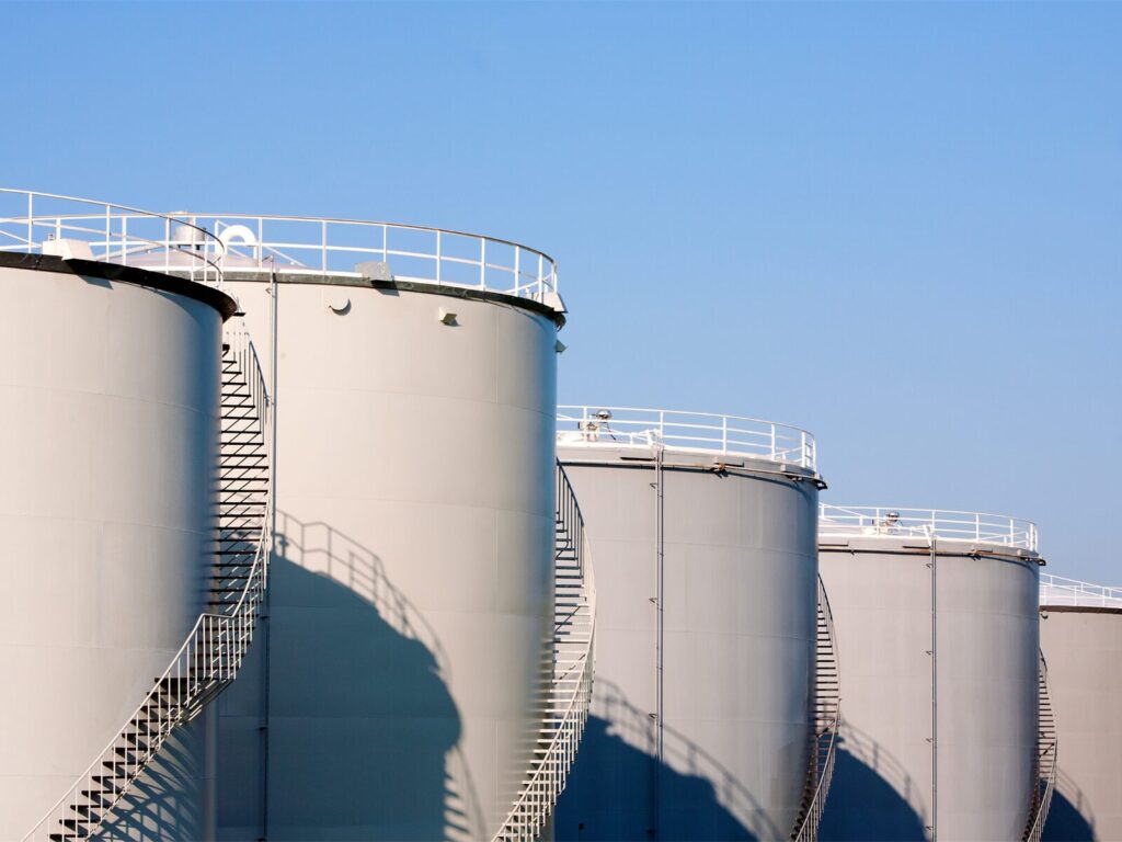 A series of five massive diesel tanks