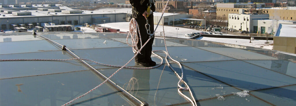 Fall arrest system on a rooftop