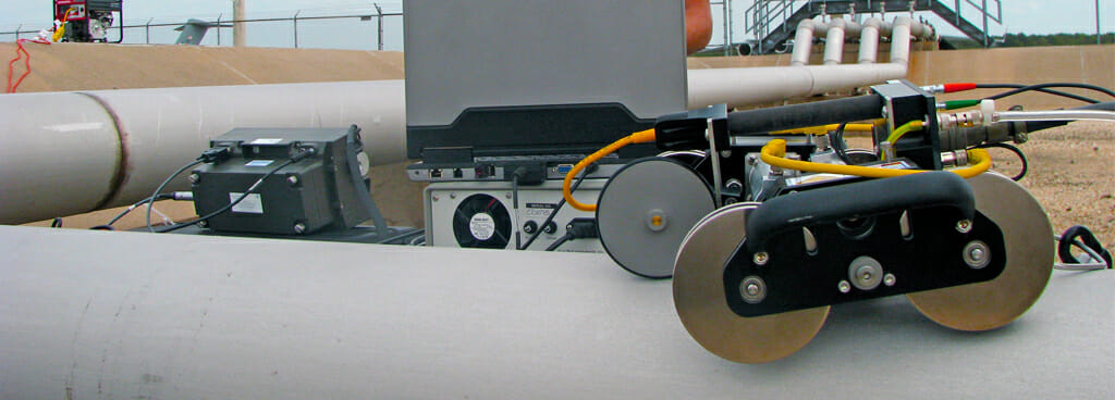 Ultrasonic pipe thickness testing equipment on a pipe