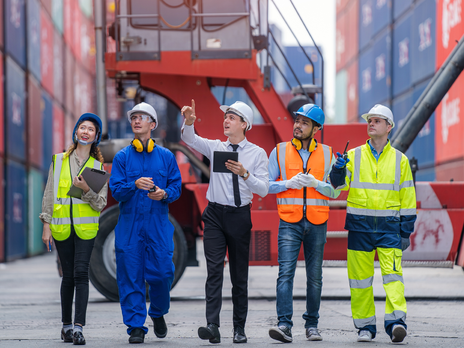 A team of forensic engineering consultants at a container yard