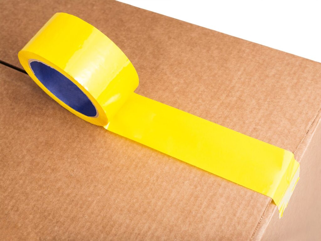 Flexible packaging tape on a cardboard box