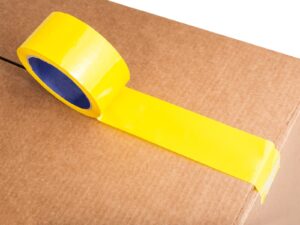 Flexible packaging tape on a cardboard box