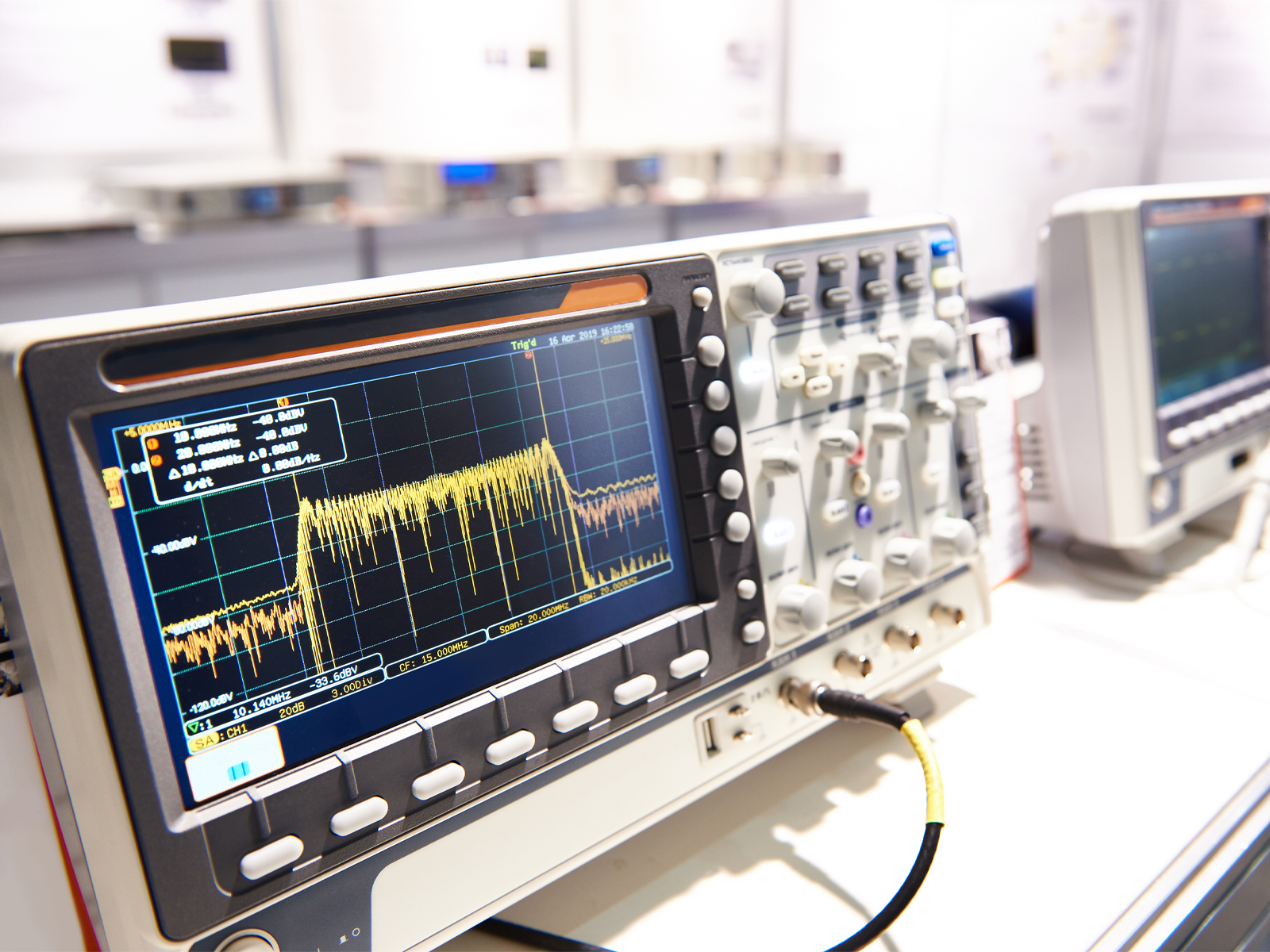 Oscilloscope Spectrum Analyzer Being Used to Determine Effects of Electromagnetic Radiation on Electronic Signal Output