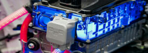A blue lithium ion battery pack operates with power connections in an electric vehicle