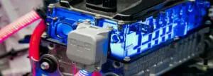 A blue lithium ion battery pack operates with power connections in an electric vehicle