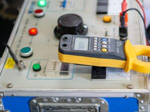 A high potential (HiPot) tester connected to multimeter