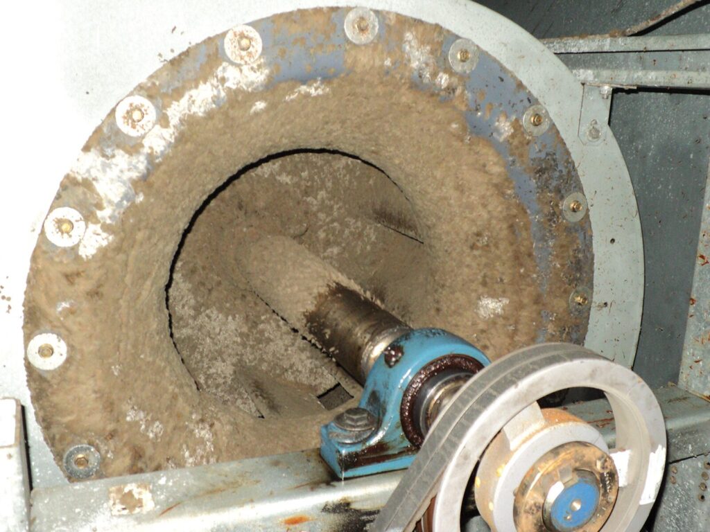 Large industrial machine covered in mold
