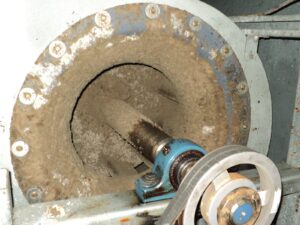 Large industrial machine covered in mold