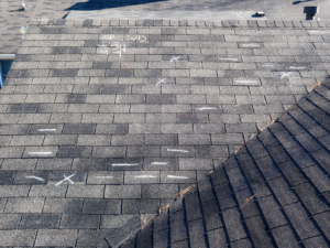 Roof with chalk markings of observations during an inspection