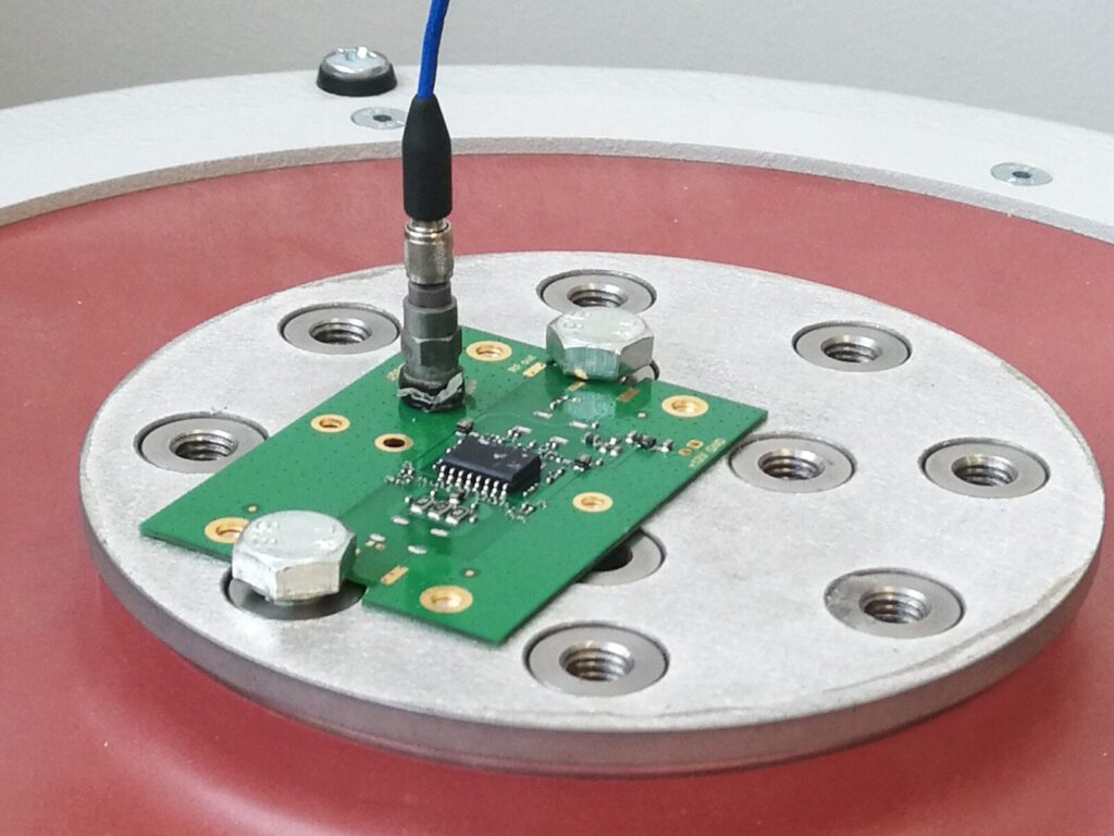 Printed circuit board on a vibration table