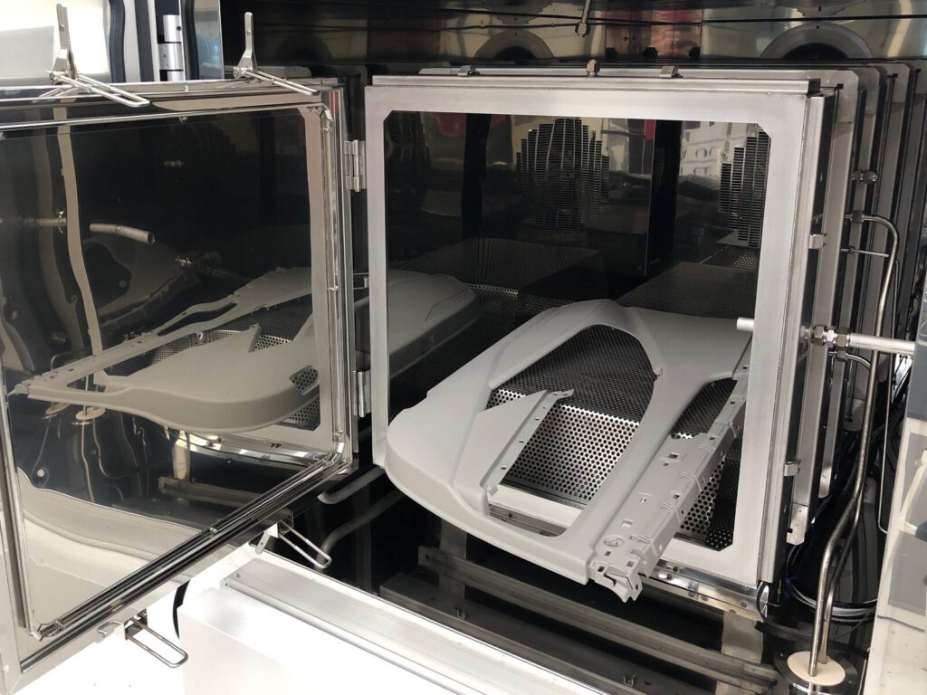 Chemical analysis chamber with an automotive part