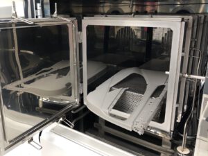 Chemical analysis chamber with an automotive part