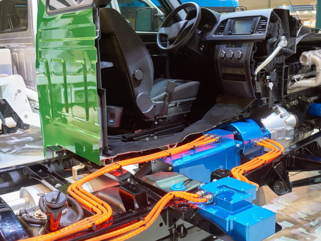 Exposed side of a semi-truck. The electric battery pack below the cabin powers the vehicle.