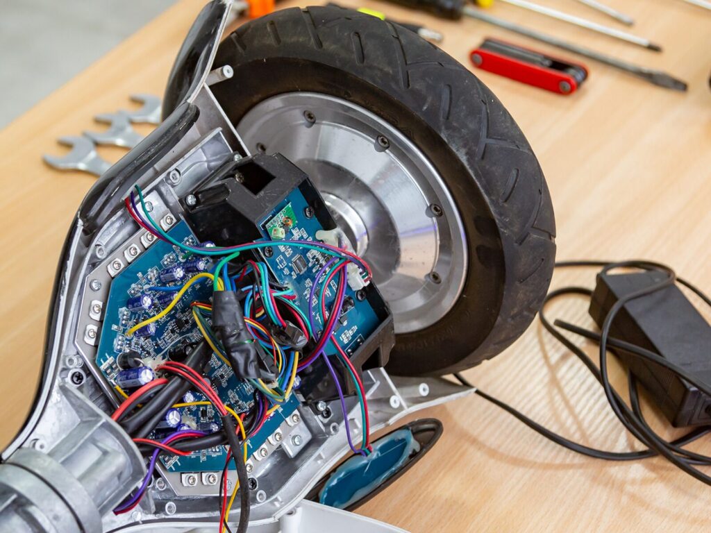 Exposed wiring and battery of a hoverboard