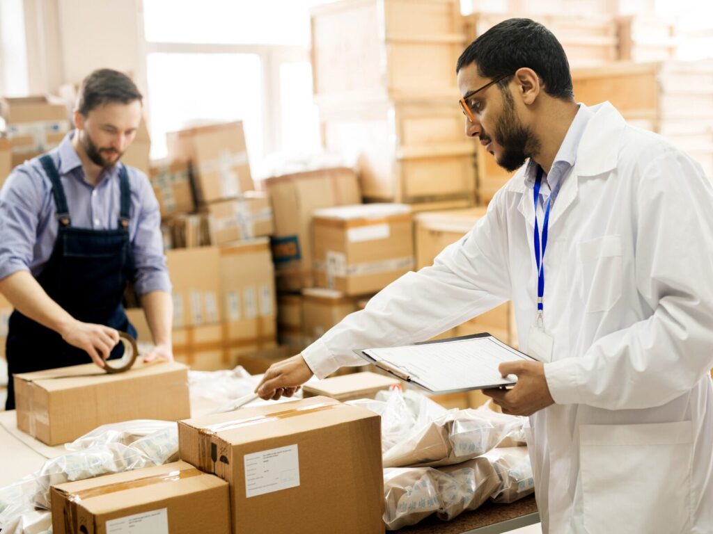 Engineer inspects a package at a warehouse