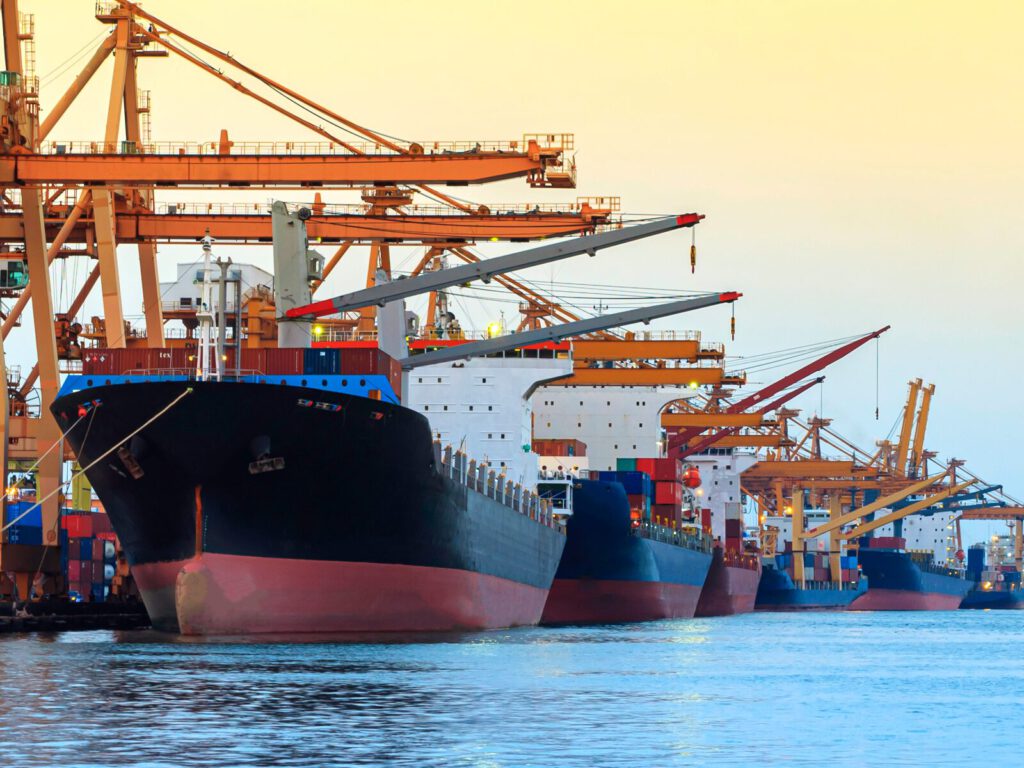 A series of ships at a dockyard