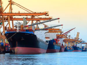 A series of ships at a dockyard