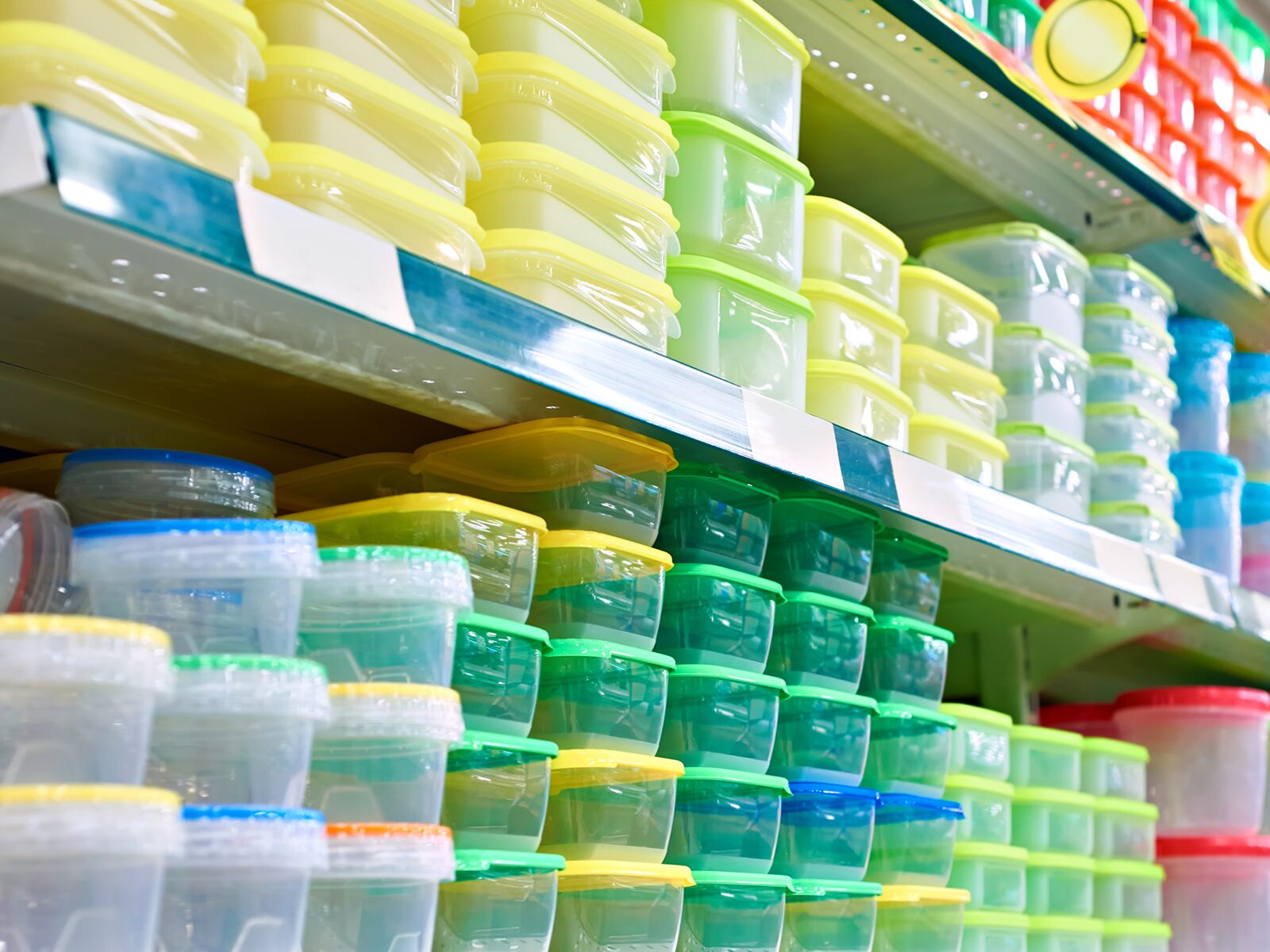 A store aisle of plastic food containers